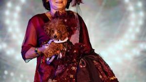 A pet owner carries her Poodle dog dressed in a gown at a pet fashion show celebrating World Animals Day in Quezon City, Metro Manila, Philippines, October 6, 2019. REUTERS/Eloisa Lopez(REUTERS) A pet owner carries her Poodle dog dressed in a gown at a pet fashion show celebrating World Animals Day in Quezon City, Metro Manila, Philippines, October 6, 2019. REUTERS/Eloisa Lopez(REUTERS)
