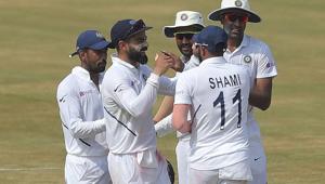 Indian cricket captain Virat Kohli, second left, celebrates with team members(AP) Indian cricket captain Virat Kohli, second left, celebrates with team members(AP)