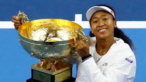 Naomi Osaka of Japan celebrates winning China Open with her trophy.(REUTERS) Naomi Osaka of Japan celebrates winning China Open with her trophy.(REUTERS)