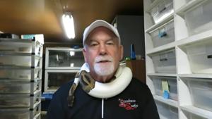 Brian Gundy’s duffel bag contained three pythons and a lizard.(YouTube/Brian Gundy) Brian Gundy’s duffel bag contained three pythons and a lizard.(YouTube/Brian Gundy)