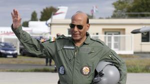 Defence Minister Rajnath Singh gestures before a test flight in a Rafale jet fighter at the Dassault Aviation plant in Merignac, near Bordeaux, southwestern France, Tuesday, Oct. 8, 2019.(AP) Defence Minister Rajnath Singh gestures before a test flight in a Rafale jet fighter at the Dassault Aviation plant in Merignac, near Bordeaux, southwestern France, Tuesday, Oct. 8, 2019.(AP)