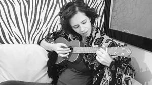 Kalki Koechlin plays a ukulele in her vanity van. Kalki Koechlin plays a ukulele in her vanity van.