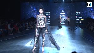 <p>Day 1 of the Lotus Make-up India Fashion Week SS'20 kicked off on October 9 at Major Dhyan Chand National Stadium, India Gate, New Delhi. There was IKAI by Ragini Ahuja, Pramaa y Pratima Pandey, Amita Gupta Sustainable, Diksha Khanna, Nidhi Yasha, Samant Chauhan, Rimzim Dadu and Pepsi X HUEMN. Samant Chauhan showcased his clothing line which was inspired from 'Starry Night in Spiti Valley.' Chauhan said he wanted to translate Vincent van Gogh's 'Starry Night' into his collection. Dadu on the other hand used steel wires and metallic cords for her clothing line.</p>