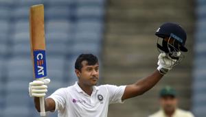 Pune: Indian cricketer Mayank Agarwal raises his bat after scoring a century.(PTI) Pune: Indian cricketer Mayank Agarwal raises his bat after scoring a century.(PTI)