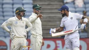India skipper Virat Kohli speaks to Faf du Plessis on second day of Pune Test.(PTI) India skipper Virat Kohli speaks to Faf du Plessis on second day of Pune Test.(PTI)