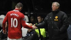 File photo of Sir Alex Ferguson with Wayne Rooney.(Reuters)