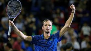 Daniil Medvedev of Russia celebrates with the trophy.(REUTERS) Daniil Medvedev of Russia celebrates with the trophy.(REUTERS)