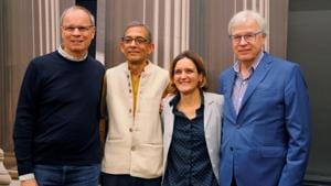 Abhijit Banerjee and Esther Duflo, two of the three winners of the 2019 Nobel Prize in Economics, pose for a photograph with 2016 Nobel Prize in Economics laureate Bengt Holstrom and 2014 laureate Jean Tirole at the Massachusetts Institute of Technology (MIT) in Cambridge, Massachusetts, U.S.(REUTERS) Abhijit Banerjee and Esther Duflo, two of the three winners of the 2019 Nobel Prize in Economics, pose for a photograph with 2016 Nobel Prize in Economics laureate Bengt Holstrom and 2014 laureate Jean Tirole at the Massachusetts Institute of Technology (MIT) in Cambridge, Massachusetts, U.S.(REUTERS)