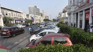 Parking a car in a popular area such as Connaught Place (CP) for a 10-hour workday can become costly soon.(Sonu Mehta/HT PHOTO)
