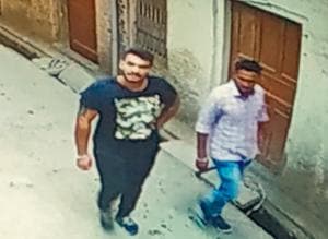 A CCTV grab showing the accused leaving the locality after the incident in Kumbra village on Friday morning.(HT PHOTO) A CCTV grab showing the accused leaving the locality after the incident in Kumbra village on Friday morning.(HT PHOTO)