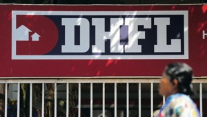 A woman walks past a signboard of Dewan Housing Finance Corporation Ltd (DHFL) in Mumbai.(Reuters file photo) A woman walks past a signboard of Dewan Housing Finance Corporation Ltd (DHFL) in Mumbai.(Reuters file photo)
