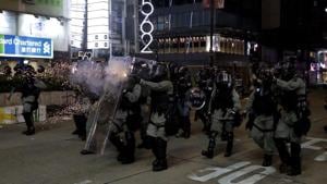 Police fire tear gas to disperse protesters in Hong Kong.(AP Photo) Police fire tear gas to disperse protesters in Hong Kong.(AP Photo)