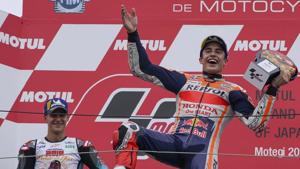 Spain's MotoGP rider Marc Marquez celebrates after winning the MotoGP Japanese Motorcycle Grand Prix at the Twin Ring Motegi circuit in Motegi, north of Tokyo, Sunday, Oct. 20, 2019(AP)