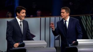 Liberal leader Justin Trudeau and Conservative leader Andrew Scheer take part in the Federal leaders French language debate in Gatineau, Quebec, Canada.(Reuters photo) Liberal leader Justin Trudeau and Conservative leader Andrew Scheer take part in the Federal leaders French language debate in Gatineau, Quebec, Canada.(Reuters photo)