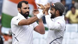 Ranchi: Indian bowler Mohammed Shami celebrates with teammate Rohit Sharma.(PTI) Ranchi: Indian bowler Mohammed Shami celebrates with teammate Rohit Sharma.(PTI)