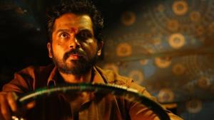 Karthi in a scene from Kaithi. Karthi in a scene from Kaithi.