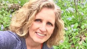 On that Saturday in October 2017, the 52-year-old athlete showed Donald Trump exactly what she thought of him, as his imposing convoy of black SUVs passed her on the road outside the Trump National Golf Club.(Juli Briskman/Facebook image) On that Saturday in October 2017, the 52-year-old athlete showed Donald Trump exactly what she thought of him, as his imposing convoy of black SUVs passed her on the road outside the Trump National Golf Club.(Juli Briskman/Facebook image)