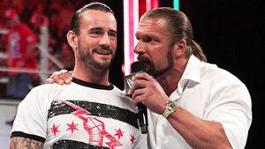 CM Punk (L) and Triple H.(Twitter) CM Punk (L) and Triple H.(Twitter)