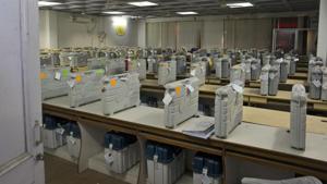 Cases containing electronic voting machines sit in a strong room before the beginning of vote counting.(AP Photo) Cases containing electronic voting machines sit in a strong room before the beginning of vote counting.(AP Photo)