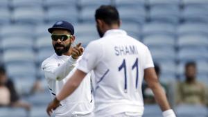 Indian cricket team captain Virat Kohli gestures towards teammate Mohammed Shami(AP) Indian cricket team captain Virat Kohli gestures towards teammate Mohammed Shami(AP)