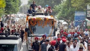 Punjab Chief Minister Capt Amarinder Singh with Congress candidate Balwinder Singh Dhaliwal (R) during a road show ahead of bypoll elections in Phagwara, Punjab.(Photo by Pardeep Pandit/Hindustan Times) Punjab Chief Minister Capt Amarinder Singh with Congress candidate Balwinder Singh Dhaliwal (R) during a road show ahead of bypoll elections in Phagwara, Punjab.(Photo by Pardeep Pandit/Hindustan Times)