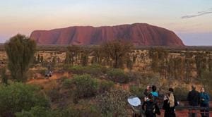 People view Uluru, formerly known as Ayers Rock, the day before a permanent ban on climbing the monolith takes effect following a decades-long fight by indigenous people to close the trek, near Yulara, Australia, October 25, 2019.(REUTERS) People view Uluru, formerly known as Ayers Rock, the day before a permanent ban on climbing the monolith takes effect following a decades-long fight by indigenous people to close the trek, near Yulara, Australia, October 25, 2019.(REUTERS)