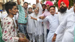 Congress supporters celebrate a party candidate's win in the Assembly election in Karnal on Thursday.(Photo: PTI) Congress supporters celebrate a party candidate's win in the Assembly election in Karnal on Thursday.(Photo: PTI)