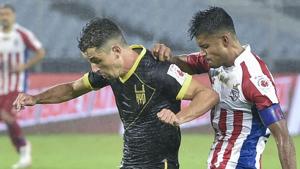 Kolkata: ATK Captain Pritam Kotal and Hyderabad FC player Marcelo Leite Pereira in action.(PTI) Kolkata: ATK Captain Pritam Kotal and Hyderabad FC player Marcelo Leite Pereira in action.(PTI)