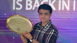 Newly elected BCCI President Sourav Ganguly holds a memento that was presented to him during a felicitation program by Cricket Association of Bengal (CAB), at Eden Garden.(Samir Jana / Hindustan Times)