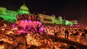 Devotees light earthen lamps on the bank of Saryu River during Deepotsav celebrations in Ayodhya on Saturday, October 26.(Photo: PTI)