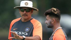 India head coach Ravi Shastri (left) and Rishabh Pant during a nets session.(PA Images via Getty Images) India head coach Ravi Shastri (left) and Rishabh Pant during a nets session.(PA Images via Getty Images)