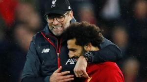 Liverpool's Mohamed Salah celebrates with manager Juergen Klopp.(Reuters) Liverpool's Mohamed Salah celebrates with manager Juergen Klopp.(Reuters)