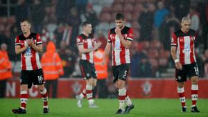 Southampton's Jack Stephens, James Ward-Prowse and Oriol Romeu look dejected at the end of the match.(REUTERS) Southampton's Jack Stephens, James Ward-Prowse and Oriol Romeu look dejected at the end of the match.(REUTERS)