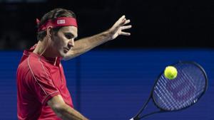 Switzerland's Roger Federer returns a ball.(AP) Switzerland's Roger Federer returns a ball.(AP)