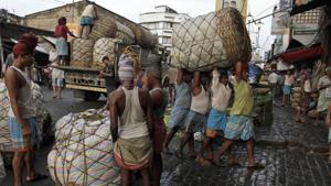 Trade laws need to be changed so that Indian companies can more easily acquire land and hire and fire workers.(AP Photo) Trade laws need to be changed so that Indian companies can more easily acquire land and hire and fire workers.(AP Photo)