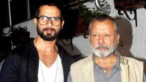Shahid Kapoor poses with dad Pankaj Kapur at an event. Shahid Kapoor poses with dad Pankaj Kapur at an event.