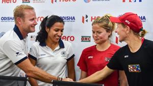 United States women's hockey team head coach Janneke Schopman (R) shakes hands with his Indian counterpart Marine Sjoerd (L) as the two captains Rani Rampal of India and Kathleen Sharkey of the US look on.(PTI) United States women's hockey team head coach Janneke Schopman (R) shakes hands with his Indian counterpart Marine Sjoerd (L) as the two captains Rani Rampal of India and Kathleen Sharkey of the US look on.(PTI)