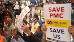 Account-holders in the Punjab and Maharashtra Co-operative Bank (PMC) protest in Mumbai over the Reserve Bank of India (RBI)'s curb on the bank.(PTI file photo) Account-holders in the Punjab and Maharashtra Co-operative Bank (PMC) protest in Mumbai over the Reserve Bank of India (RBI)'s curb on the bank.(PTI file photo)