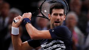 Serbia's Novak Djokovic in action during his semi final match against Bulgaria's Grigor Dimitrov.(REUTERS) Serbia's Novak Djokovic in action during his semi final match against Bulgaria's Grigor Dimitrov.(REUTERS)