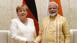 Germany’s Angela Merkel said Germany will spend one billion euros ($1.12 billion) in the next five years on green urban mobility projects conceived under the new German-Indian partnership.(PTI) Germany’s Angela Merkel said Germany will spend one billion euros ($1.12 billion) in the next five years on green urban mobility projects conceived under the new German-Indian partnership.(PTI)