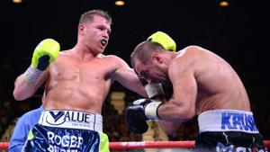 Canelo Alvarez (blue/green trunks) and Sergey Kovalev (black/white/red trunks) during their WBO light heavyweight title bout at MGM Grand Garden Arena.(USA TODAY Sports) Canelo Alvarez (blue/green trunks) and Sergey Kovalev (black/white/red trunks) during their WBO light heavyweight title bout at MGM Grand Garden Arena.(USA TODAY Sports)