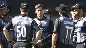 New Zealand's Mitchell Santner, center, after dismissing England's Eion Morgan during the in Wellington, New Zealand.(AP)