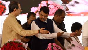 Maharashtra CM Devendra Fadnavis & Shiv Sena Chief Uddhav Thackeray during 86th birth anniversary of Late Mathadi Leader AnnaSaheb Patil at APMC Onion Potato Market Vashi in Navi Mumbai.(Photo by Bachchan Kumar/ Hindustan Times) Maharashtra CM Devendra Fadnavis & Shiv Sena Chief Uddhav Thackeray during 86th birth anniversary of Late Mathadi Leader AnnaSaheb Patil at APMC Onion Potato Market Vashi in Navi Mumbai.(Photo by Bachchan Kumar/ Hindustan Times)