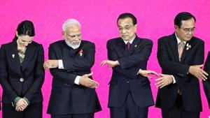 Prime Minister Narendra Modi, shakes hands with leaders at the 3rd Regional Comprehensive Economic Partnership (RCEP) summit in Bangkok, Thailand.(Reuters photo) Prime Minister Narendra Modi, shakes hands with leaders at the 3rd Regional Comprehensive Economic Partnership (RCEP) summit in Bangkok, Thailand.(Reuters photo)
