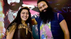 Honeypreet Insan with Dera Sacha Sauda chief Gurmeet Ram Rahim Singh.(PTI file) Honeypreet Insan with Dera Sacha Sauda chief Gurmeet Ram Rahim Singh.(PTI file)