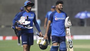 Shreyas Iyer, right and Manish Pandey return after a practice session.(AP) Shreyas Iyer, right and Manish Pandey return after a practice session.(AP)