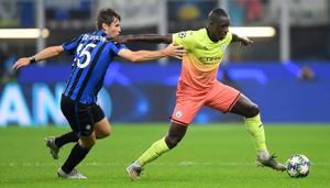 Manchester City's Benjamin Mendy in action with Atalanta's Marten de Roon(REUTERS) Manchester City's Benjamin Mendy in action with Atalanta's Marten de Roon(REUTERS)