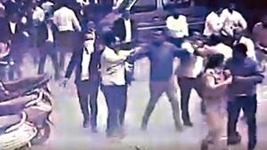 The CCTV footage purportedly shows lawyers chasing a woman police officer.(Screengrab) The CCTV footage purportedly shows lawyers chasing a woman police officer.(Screengrab)