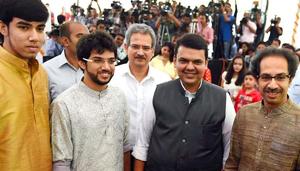Maharashtra CM Devendra Fadnavis along with Sena chief Uddhav Thackeray and his sons Tejas and Aditya. (PTI photo) Maharashtra CM Devendra Fadnavis along with Sena chief Uddhav Thackeray and his sons Tejas and Aditya. (PTI photo)