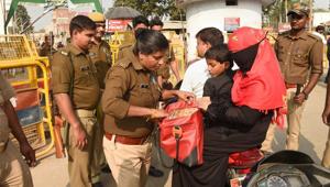 Police personnel conduct searches near the site of disputed Ram Janambhoomi-Babri Masjid site, as the verdict date nears, in Ayodhya.(Photo: PTI) Police personnel conduct searches near the site of disputed Ram Janambhoomi-Babri Masjid site, as the verdict date nears, in Ayodhya.(Photo: PTI)